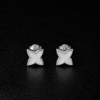 a93298b5-c9f7-4640-92ce-2e2ba7485e32 Aretes Icons Blancos